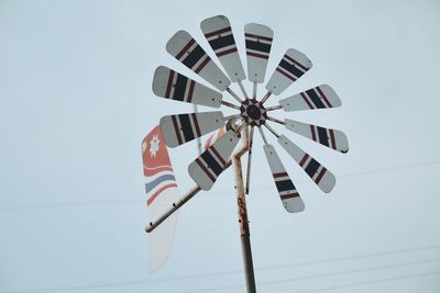 Low angle view of umbrella against sky