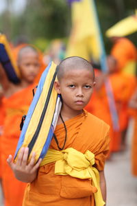 Portrait of boy standing outdoors