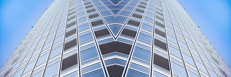 Low angle view of modern building against clear sky