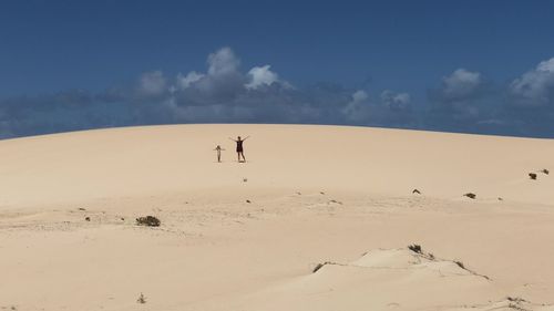 Scenic view of desert against sky