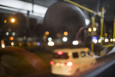 Close-up portrait of illuminated lighting equipment