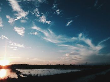 Scenic view of sea at sunset