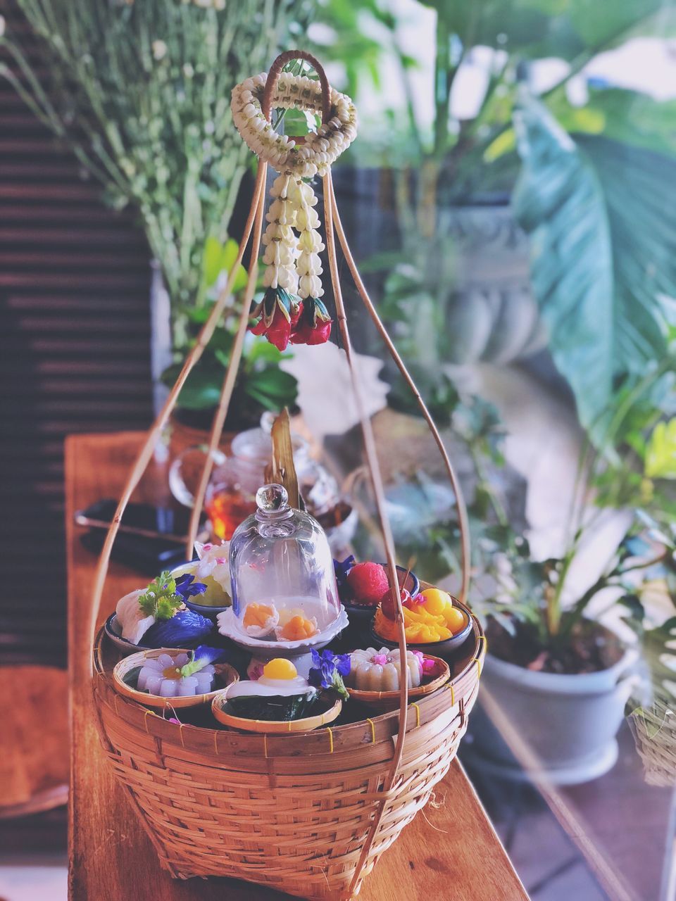 food and drink, food, focus on foreground, freshness, no people, table, plant, decoration, close-up, flowering plant, healthy eating, flower, container, day, potted plant, fruit, still life, nature, vase, plastic, glass, flower arrangement, bouquet