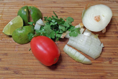 High angle view of vegetables on cutting board