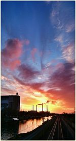 View of street against dramatic sky