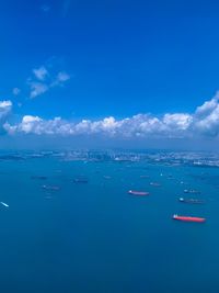 Scenic view of sea against blue sky