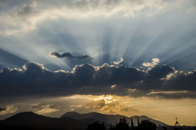Low angle view of silhouette mountain against sky