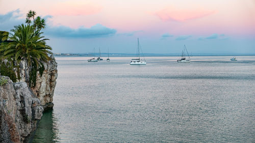 Scenic view of sea against sky during sunset