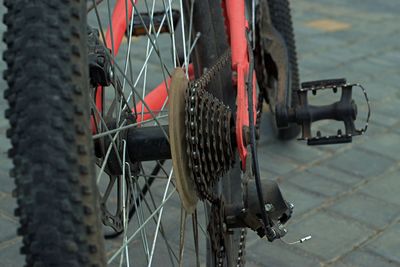 Close-up of bicycle on street