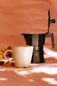 Close-up of coffee cup on table