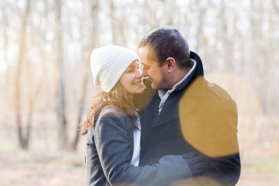 Young couple kissing outdoors