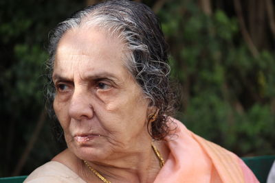 Close-up of woman looking away