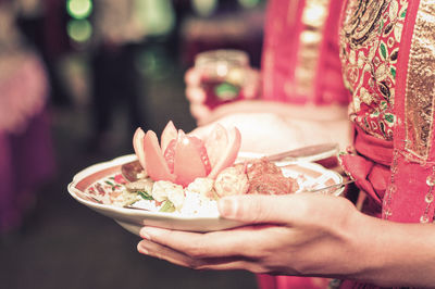Midsection of woman wedding tradisional ceremony