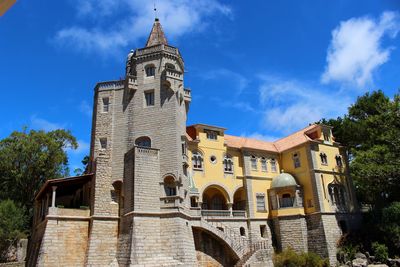 Low angle view of museu condes de castro guimaraes against sky