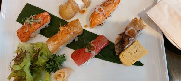 High angle view of sushi served on table