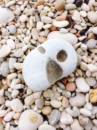 High angle view of stones on pebbles