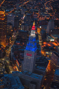 High angle view of city buildings at night