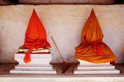 Statue of buddha against temple