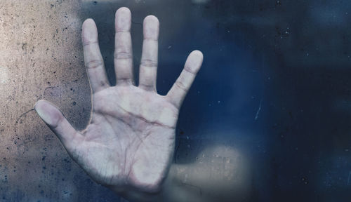 Close-up of hand on human finger