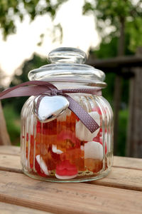 Close-up of glass jar on table