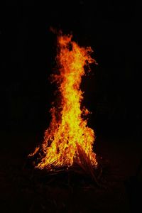 Bonfire on field at night