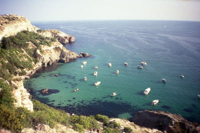 High angle view of sea shore against sky