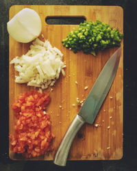 High angle view of chopped vegetables on cutting board