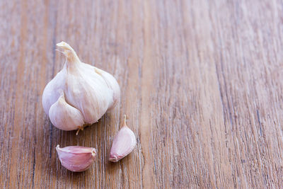 Close-up of garlic on table