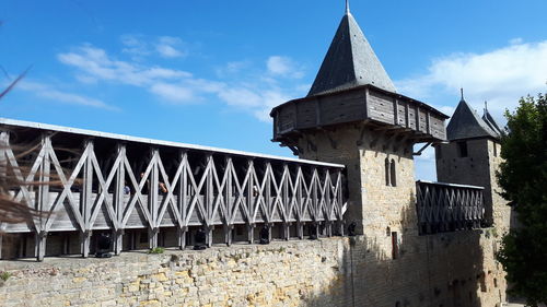 Fortified wall against sky