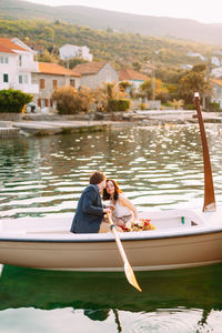 Man on boat in lake