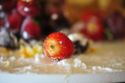 Close-up of strawberry with sugar