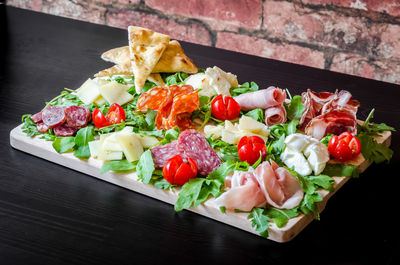 Close-up of chopped fruits on table