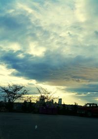 View of road against cloudy sky