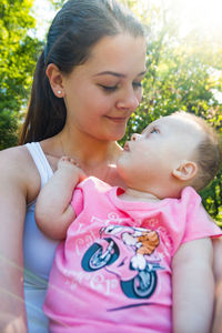 Close-up of mother and baby with down syndrome