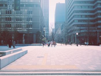 People walking on city street