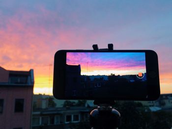 Silhouette of people at sunset