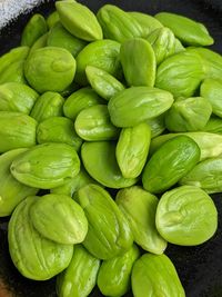 Close-up of green stinky peas