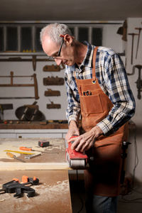 Carpenter working at workshop