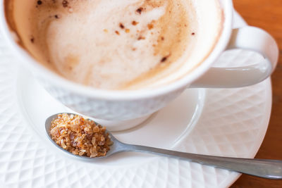 Close-up of coffee cup on table