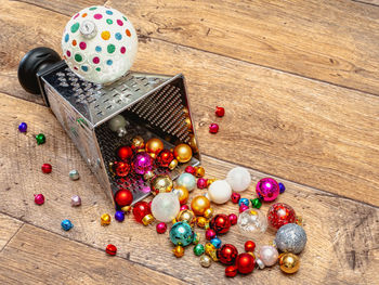 High angle view of multi colored candies on wooden table