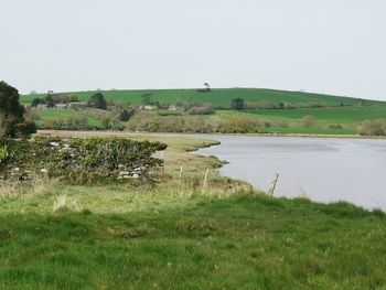 Scenic view of land against clear sky