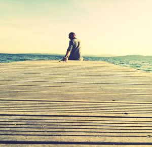 Full length of man on beach against sky