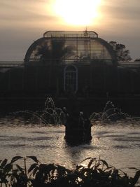 View of built structures at sunset