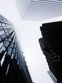 Low angle view of modern buildings against sky