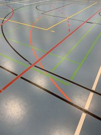 Colored lines on floor in sports facility 