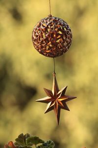 Close-up of christmas decoration hanging outdoors