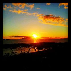 Scenic view of landscape against sky during sunset