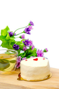 Close-up of flowers in cup