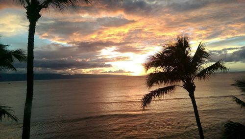 Scenic view of sea at sunset