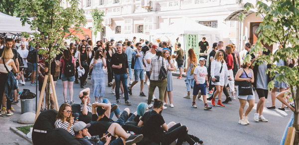 People walking on street in city